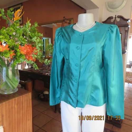 Haute Couture emerald green silk top by ADELE DALLAS ORR in size 36/12. As new.