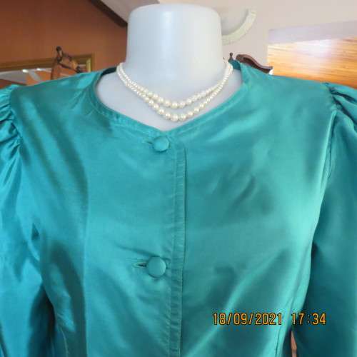 Haute Couture emerald green silk top by ADELE DALLAS ORR in size 36/12. As new.