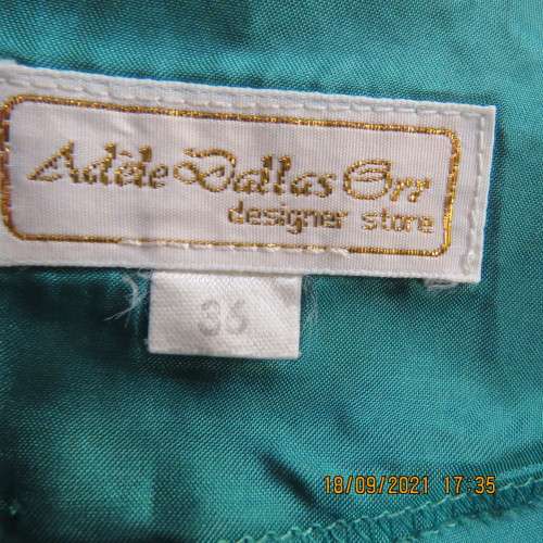 Haute Couture emerald green silk top by ADELE DALLAS ORR in size 36/12. As new.