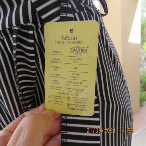 New black+white vertical striped straight legged cropped pants. Size 34/10 by THAITING from Thailand