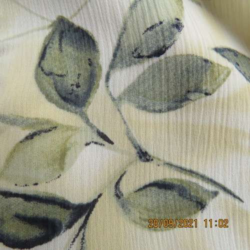 Beautiful size 52/28 short sleeve top in yellowgreen with olivegreen leaves.Button down. As new cond