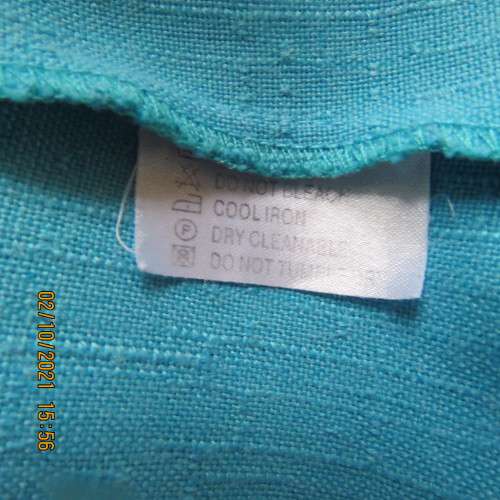 Smart sky blue summer jacket with V neck close with 2 buttons.Loose size 38/14 no label. New cond.