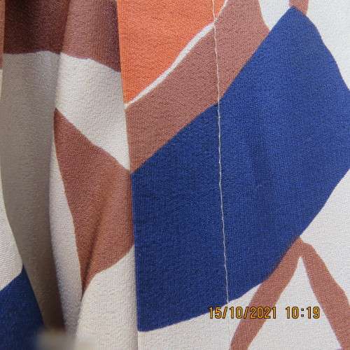 Geometric printed dark cream with navy,brick and brown patterns.Size 42/18.Button down.Good cond.