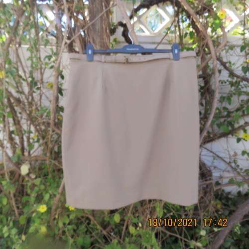 Classy fully lined khaki pencil skirt calf length size 46/22 by CALLIE from Parklane.In Trevita/Wool