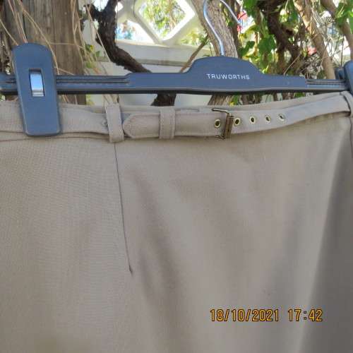 Classy fully lined khaki pencil skirt calf length size 46/22 by CALLIE from Parklane.In Trevita/Wool