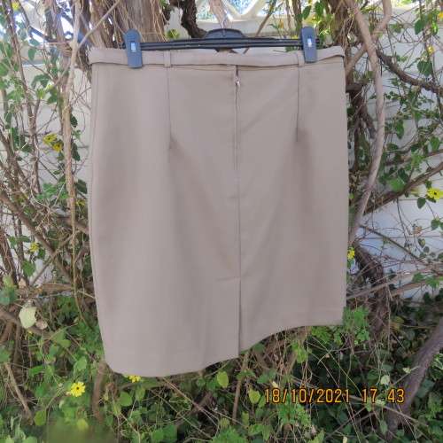 Classy fully lined khaki pencil skirt calf length size 46/22 by CALLIE from Parklane.In Trevita/Wool
