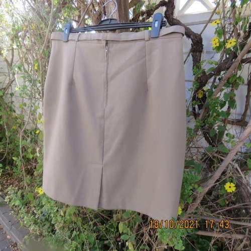 Classy fully lined khaki pencil skirt calf length size 46/22 by CALLIE from Parklane.In Trevita/Wool
