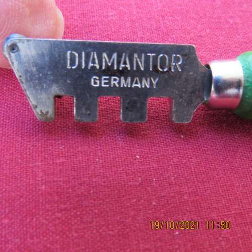 Looking for a glass cutter?? DIAMANTOR glass cutter from Germany. 13cm long.As new