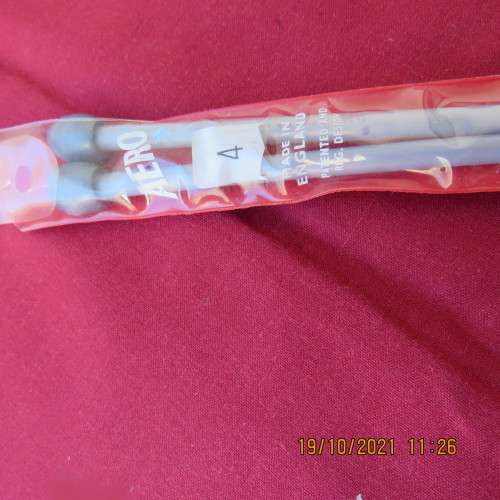 Pair of AERO plastic knitting needles size 4 made in England. New condition.