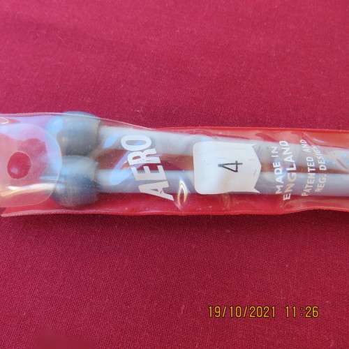 Pair of AERO plastic knitting needles size 4 made in England. New condition.