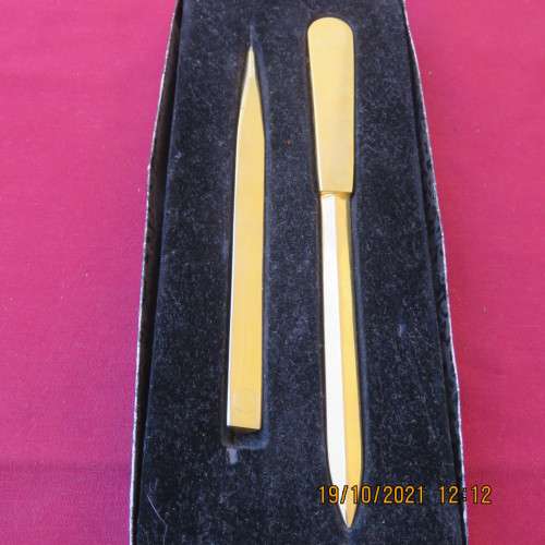 NEDBANK gift set containing a letter opener and pen in gold tone. As new.