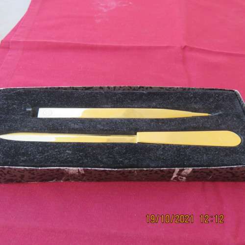 NEDBANK gift set containing a letter opener and pen in gold tone. As new.