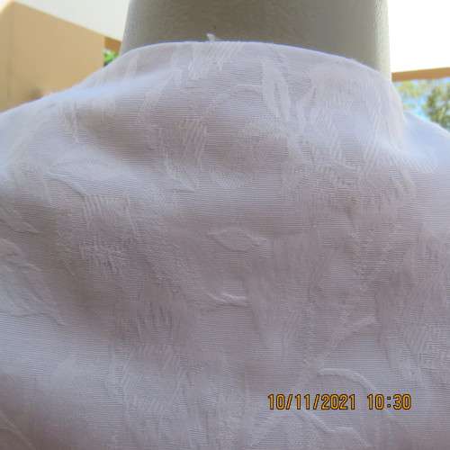 Nostalgic white embossed polyester short top/jacket with lace collar.By RHAPSODY size 34/10.As new