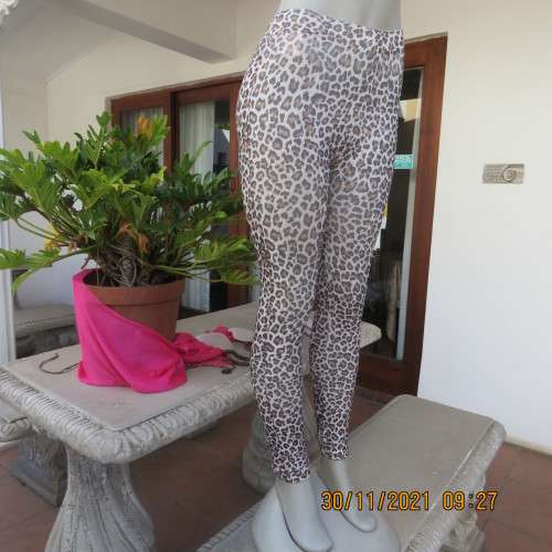 High quality stretch polycotton animal print leggings size 34/10 with wide elastic waist/legs.New