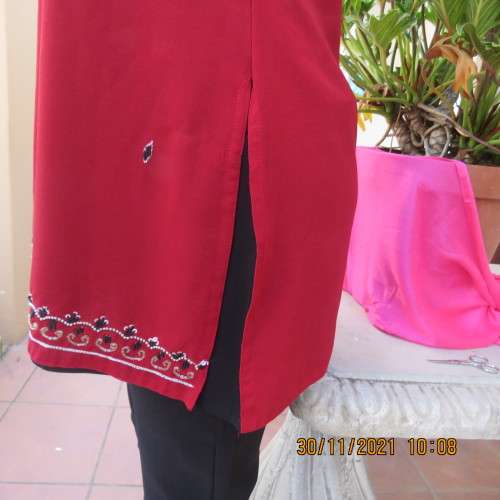 Glam richly embellished DOLCE and CABBANA ruby red sleeveless top size 36/12.Black underlay.As new