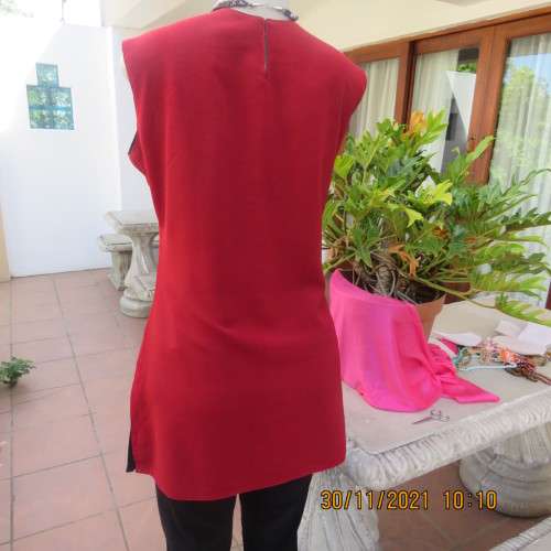 Glam richly embellished DOLCE and CABBANA ruby red sleeveless top size 36/12.Black underlay.As new