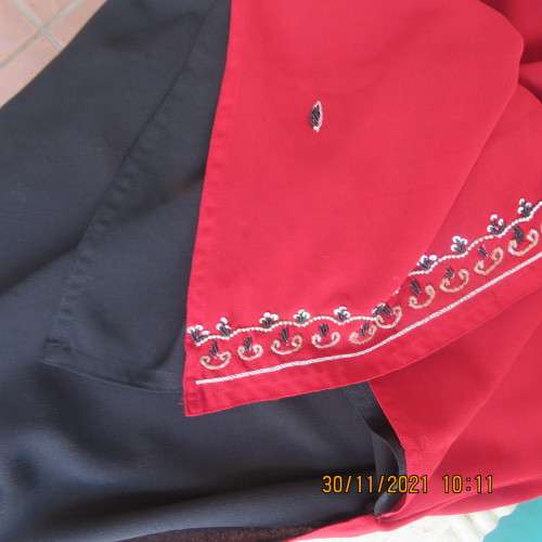 Glam richly embellished DOLCE and CABBANA ruby red sleeveless top size 36/12.Black underlay.As new