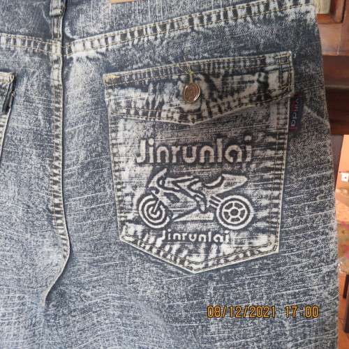 As new men`s straight leg cropped denim jeans size 34 by YILIDA. Washed out look.Logos.Pockets.
