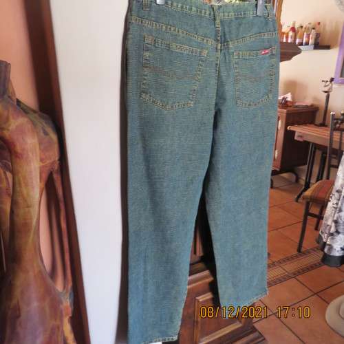 As new men`s straight legged denim jeans size 36 by JML. With lots of pockets.High waist,