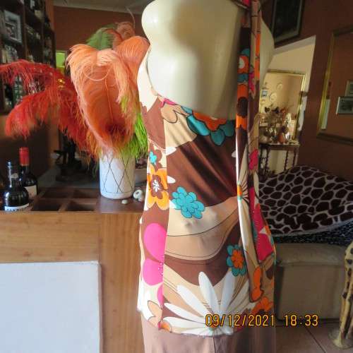 Ultra sexy long floral stretch polyester halter neck top with metal decoration size 34/10.New cond.