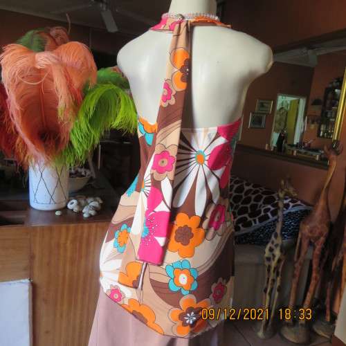 Ultra sexy long floral stretch polyester halter neck top with metal decoration size 34/10.New cond.