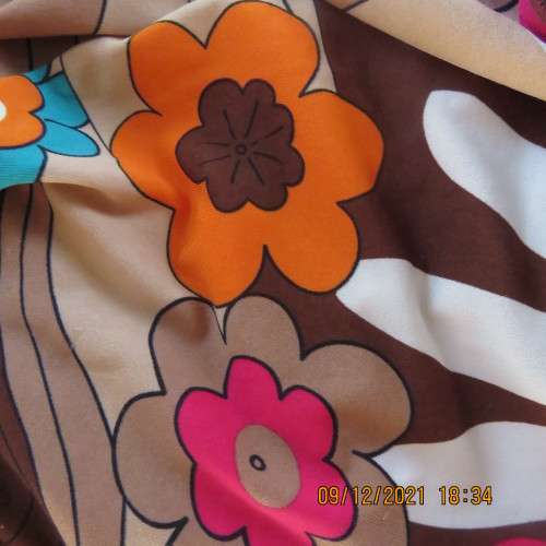 Ultra sexy long floral stretch polyester halter neck top with metal decoration size 34/10.New cond.