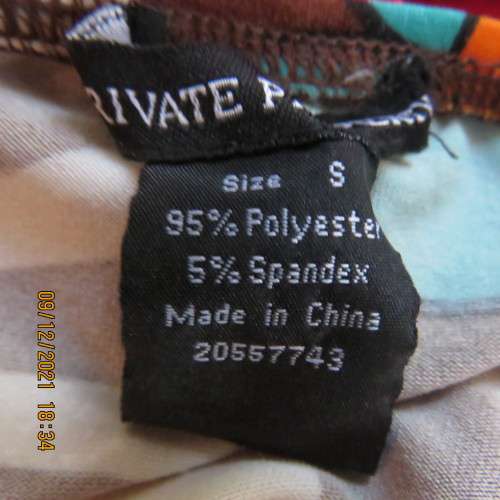 Ultra sexy long floral stretch polyester halter neck top with metal decoration size 34/10.New cond.