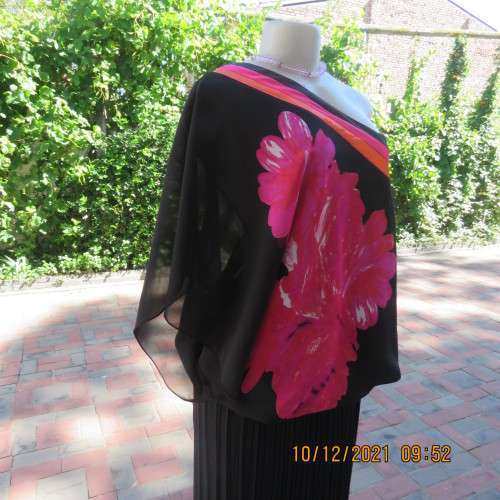 Amazing black DONNA CLAIRE one shoulder top with bold pink floral pattern.Size50/52.As new.