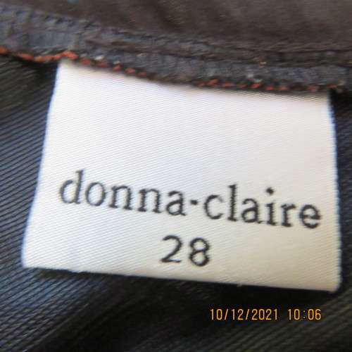 Amazing black DONNA CLAIRE one shoulder top with bold pink floral pattern.Size50/52.As new.