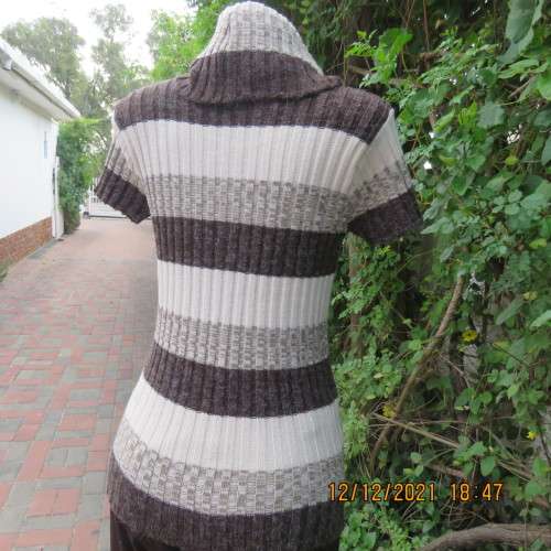 Knitted poloneck top in wide brown and cream horizontal lines. Acrylic yarn.Rib stich. Size 36 to 38