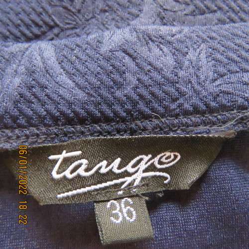 Very smart navy bodycon pencil skirt in stretch polyester with embossed flowers.Size 36/12.As new.