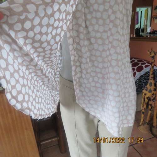 Cool ecru colour sleeveless top with white opaque dots.Size 32/8. Front cross overlay.As new