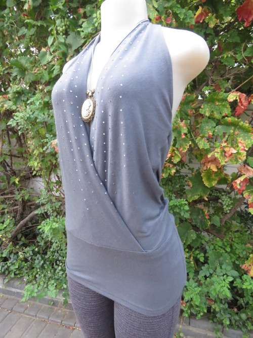 Sexy anchor grey halterneck top with embellished fronts.Waterfall style back.By TRU Glamour.Size 36