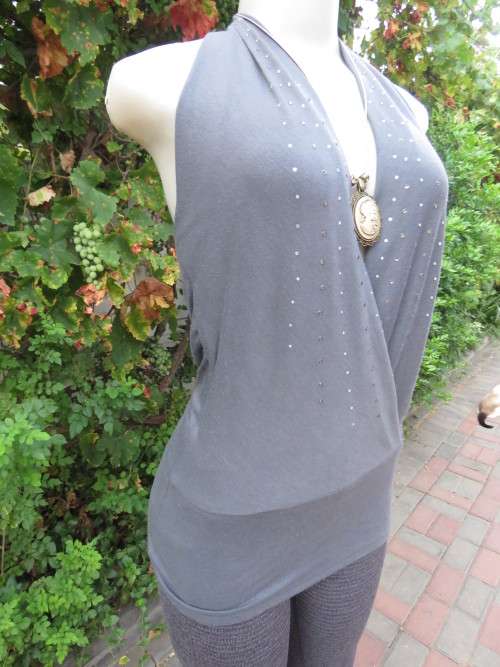 Sexy anchor grey halterneck top with embellished fronts.Waterfall style back.By TRU Glamour.Size 36