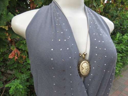 Sexy anchor grey halterneck top with embellished fronts.Waterfall style back.By TRU Glamour.Size 36