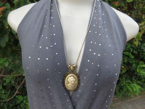 Sexy anchor grey halterneck top with embellished fronts.Waterfall style back.By TRU Glamour.Size 36