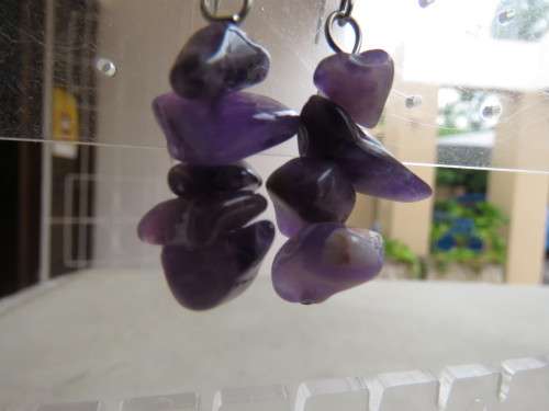 Pair of light purple small amethyst stone piercing earrings. Made up of a few stones each.New item