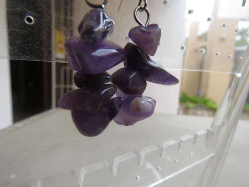 Pair of light purple small amethyst stone piercing earrings. Made up of a few stones each.New item
