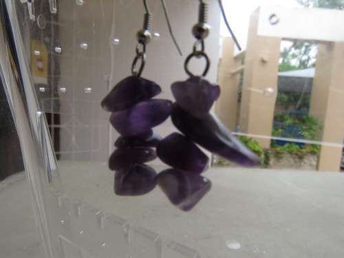 Pair of light purple small amethyst stone piercing earrings. Made up of a few stones each.New item