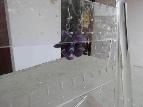 Pair of light purple small amethyst stone piercing earrings. Made up of a few stones each.New item