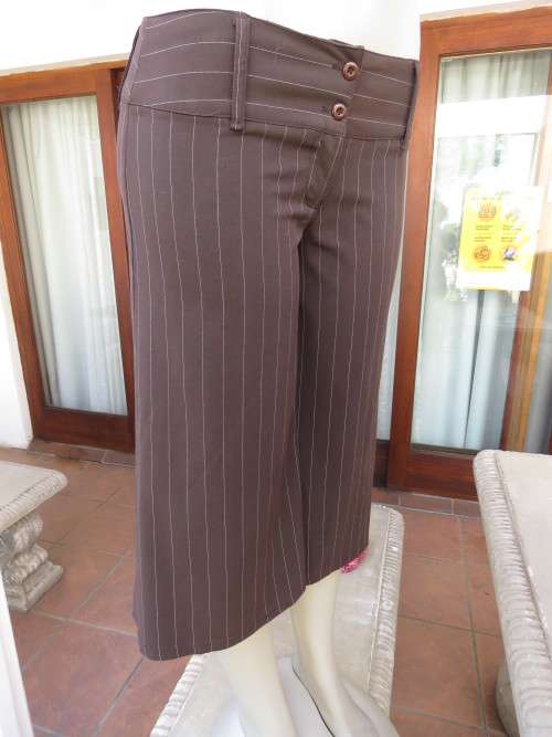 Choc brown wide legged skirt pants calf length with thin white vertical stripes.Zip on front.Size 32