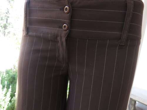 Choc brown wide legged skirt pants calf length with thin white vertical stripes.Zip on front.Size 32