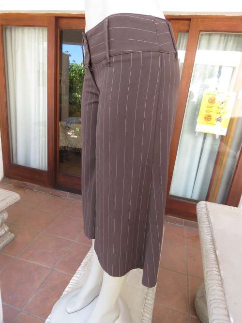 Choc brown wide legged skirt pants calf length with thin white vertical stripes.Zip on front.Size 32