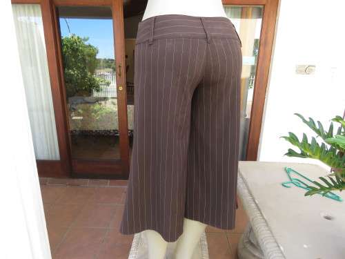 Choc brown wide legged skirt pants calf length with thin white vertical stripes.Zip on front.Size 32