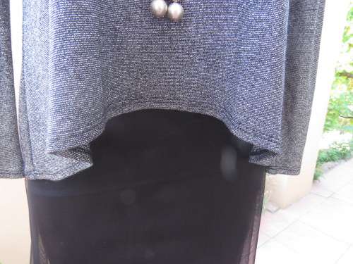 Glitter long sleeve slip over top in polyester,viscose,metalic silver.Size 36 to 38 by H+M As new