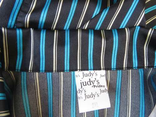 Fabulous long sleeve striped top in brown,cream and tuequoise.Size 48/24 by JUDY`S PRIDE.Button down