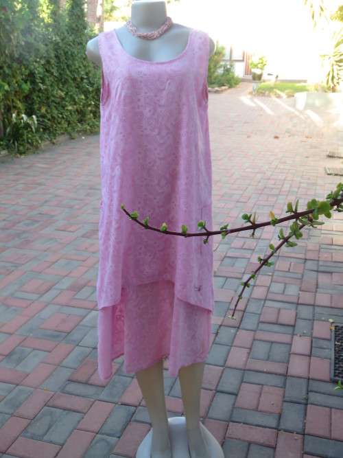As new ALABASTER pink dress in 2 shades.Loose hanging in 2 layers/lengths.Size 38/14.