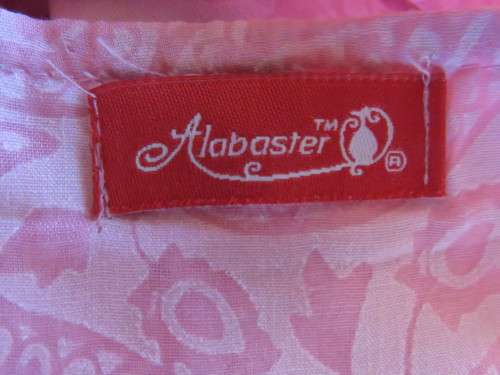 As new ALABASTER pink dress in 2 shades.Loose hanging in 2 layers/lengths.Size 38/14.