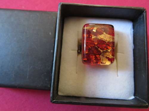 Amazing MURANO glass ring in rust and gold. Ring self Rhodium plated and size adjustable.Never used.