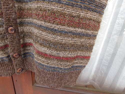 Handsome as new men`s acrylic knit sleeveless cardigan in brown and dark colours pattern lines.XL
